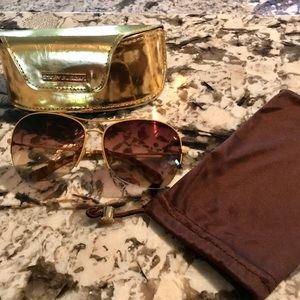 Gucci sunglasses and Tory Burch Sunglasses
